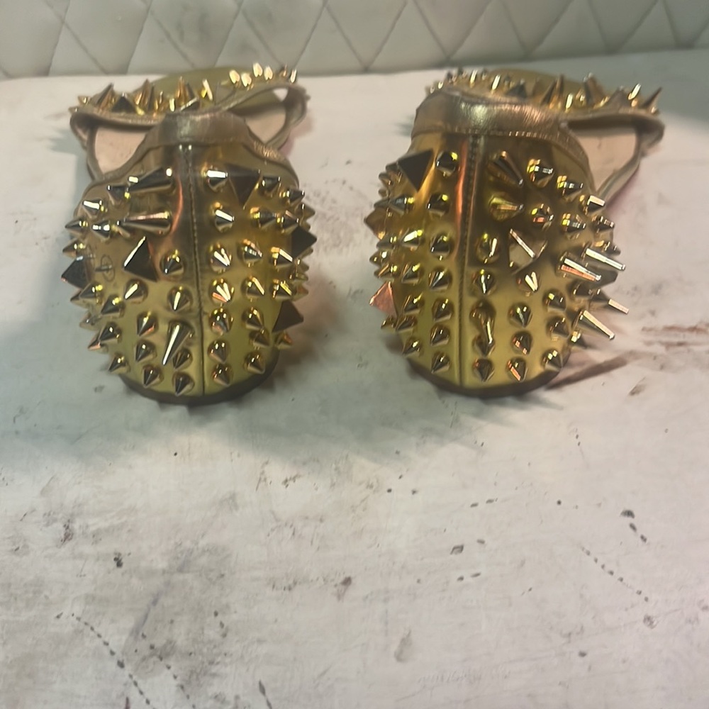 Christian louboutin red bottomed gold spiked sandals  7 1/2